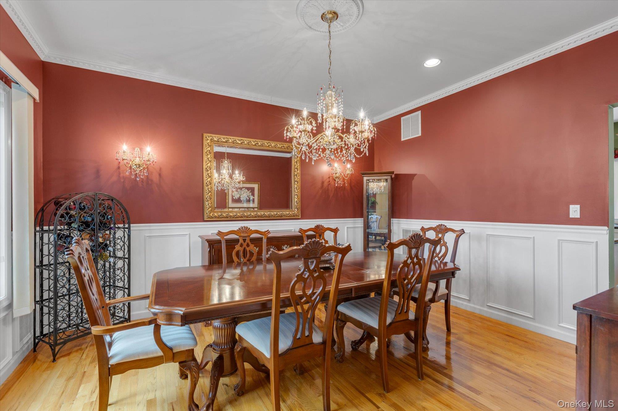 263 Old Commack Road Kings Park, NY 11754 - Photo 8 of 42 a view of a dining room with furniture and chandelier