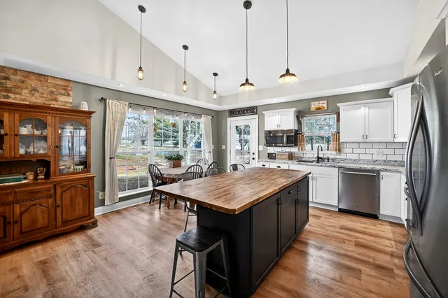 a bed room with furniture and a window