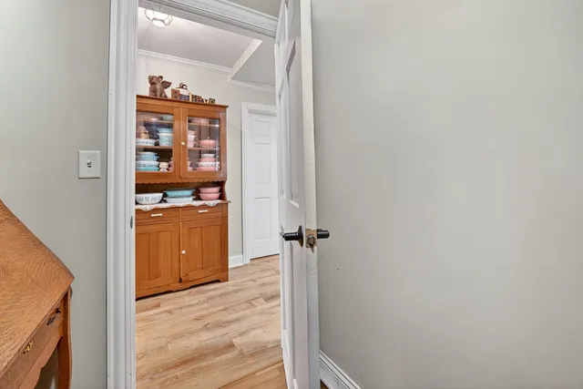 a view of yard with swimming pool and green space