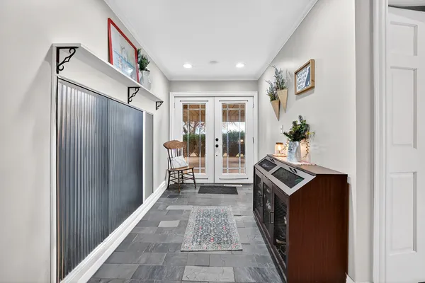 a view of room with wooden floor