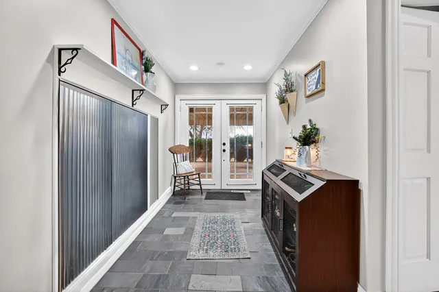 a view of room with wooden floor