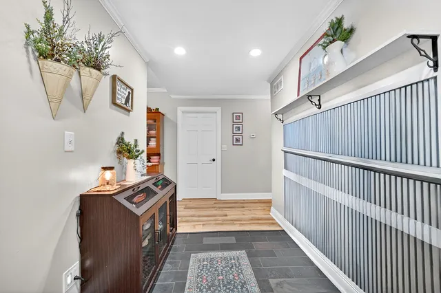 a living room with furniture and a couch