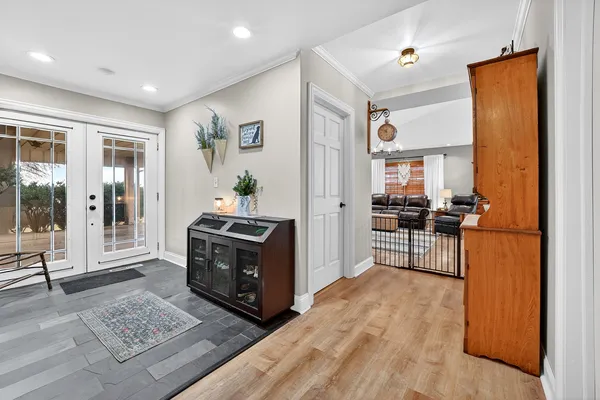 a room with furniture and a flat screen tv