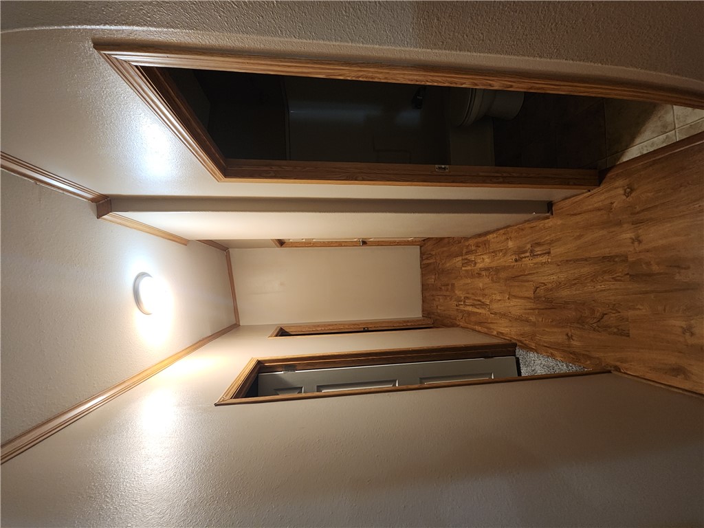 3738 Smetana Road Bryan, TX 77807 - Photo 17 of 29 a view of hallway with wooden floor
