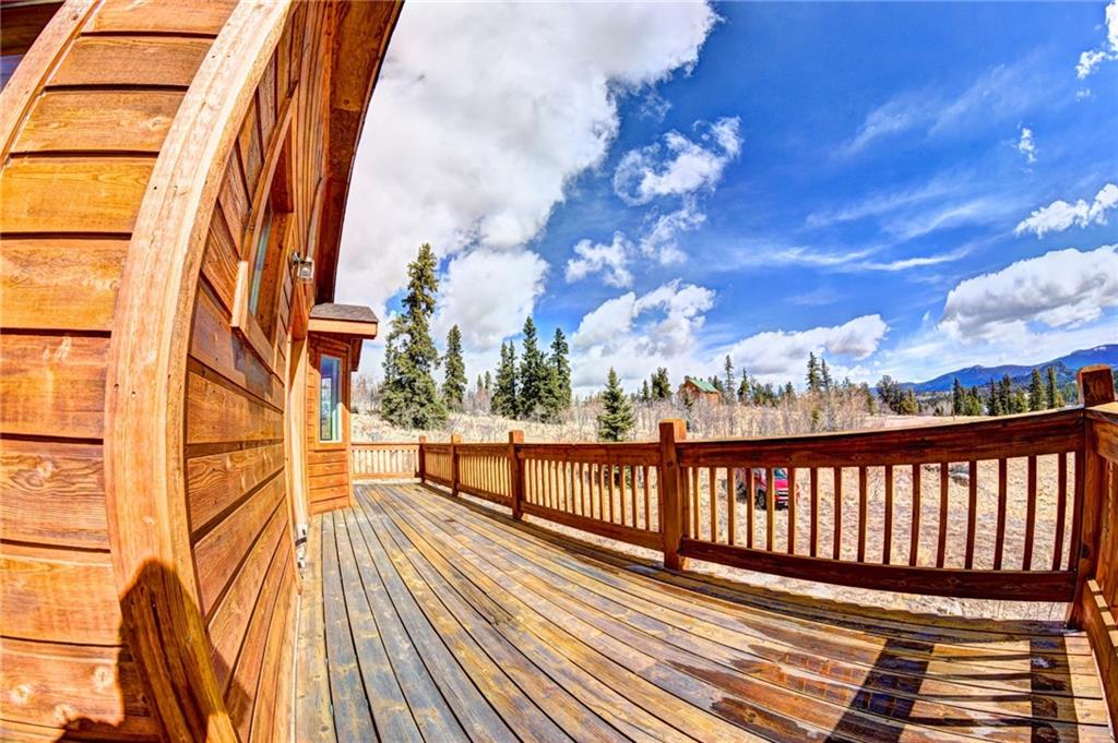 1257 Chippewa Road Como, CO 80456 - Photo 13 of 25 a view of a balcony with wooden floor and fence