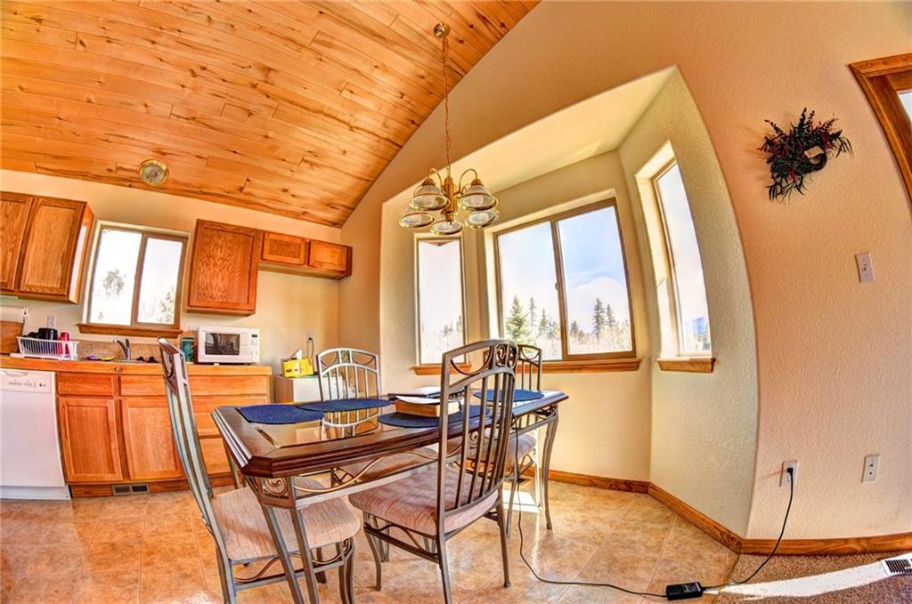 1257 Chippewa Road Como, CO 80456 - Photo 3 of 25 a dining room with furniture and a window