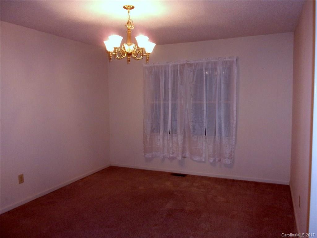 36074 Finger Road, Unit 2 Mount Pleasant, NC 28124 - Photo 15 of 21 a view of a chandelier in big room