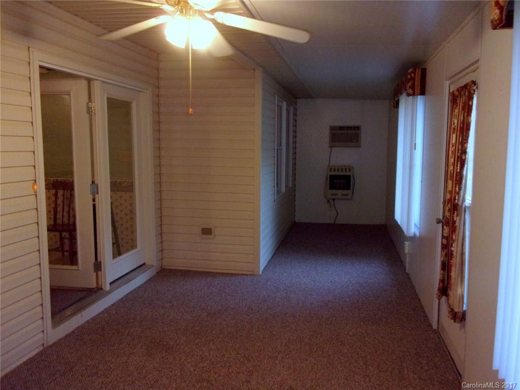 36074 Finger Road, Unit 2 Mount Pleasant, NC 28124 - Photo 17 of 21 wooden floor in an empty room