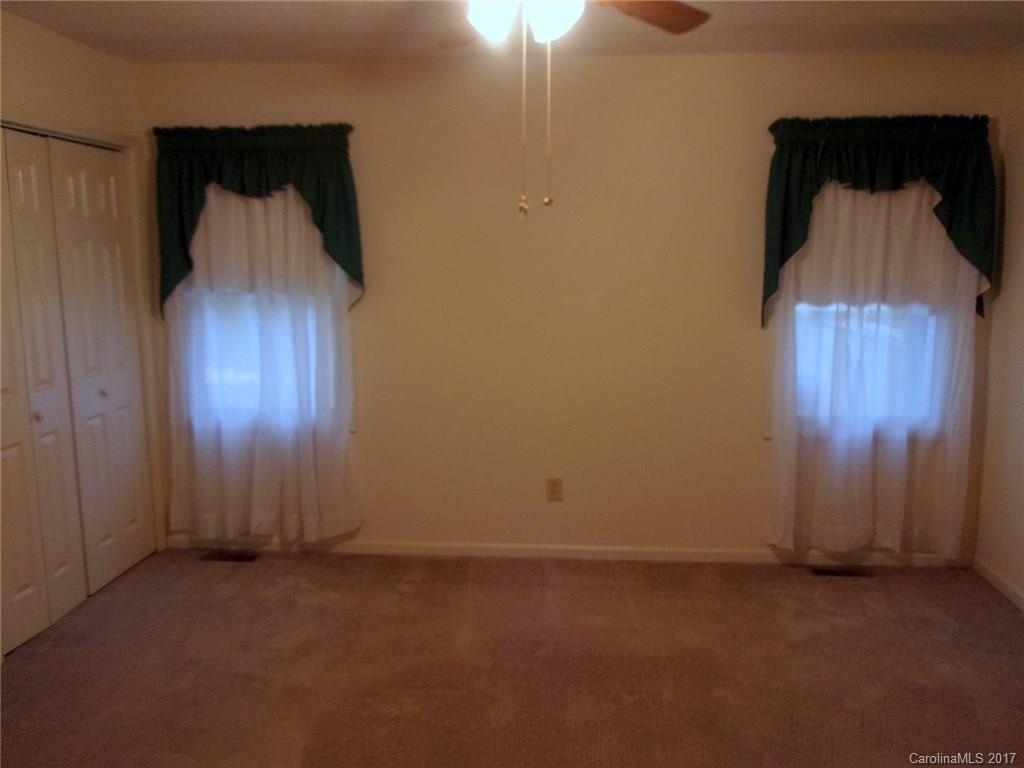 36074 Finger Road, Unit 2 Mount Pleasant, NC 28124 - Photo 9 of 21 an empty room with a window
