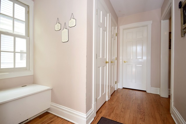 323 North Merrill Street Park Ridge, IL 60068 - Photo 18 of 25 a view of an empty room with wooden floor and a window