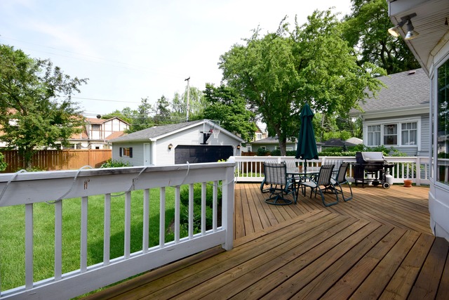 323 North Merrill Street Park Ridge, IL 60068 - Photo 23 of 25 a view of a house with wooden deck and furniture