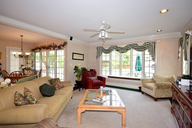 323 North Merrill Street Park Ridge, IL 60068 - Photo 7 of 25 a living room with furniture and a large window