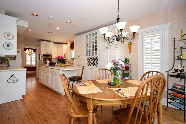 323 North Merrill Street Park Ridge, IL 60068 - Photo 9 of 25 a view of a dining room with furniture window and wooden floor