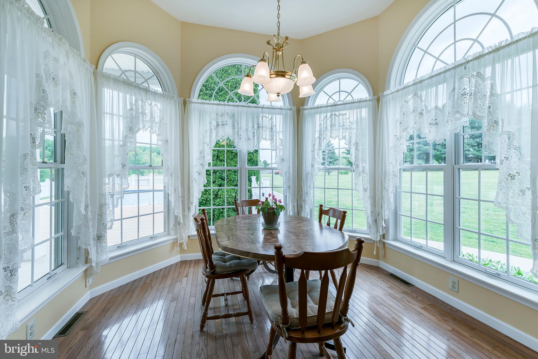 220 Sleepy Hollow Road Nottingham, PA 19362 - Photo 21 of 47 Dinette area surrounded by arched Pella windows