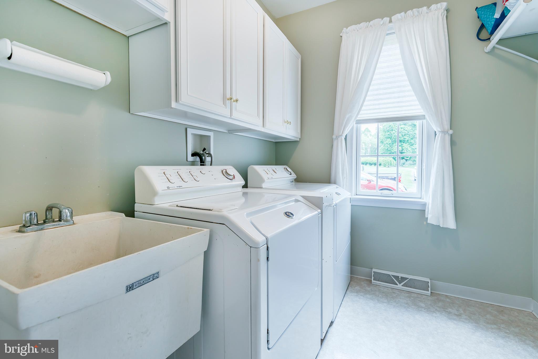 220 Sleepy Hollow Road Nottingham, PA 19362 - Photo 23 of 47 Laundry room with wash sink/storage cabinets