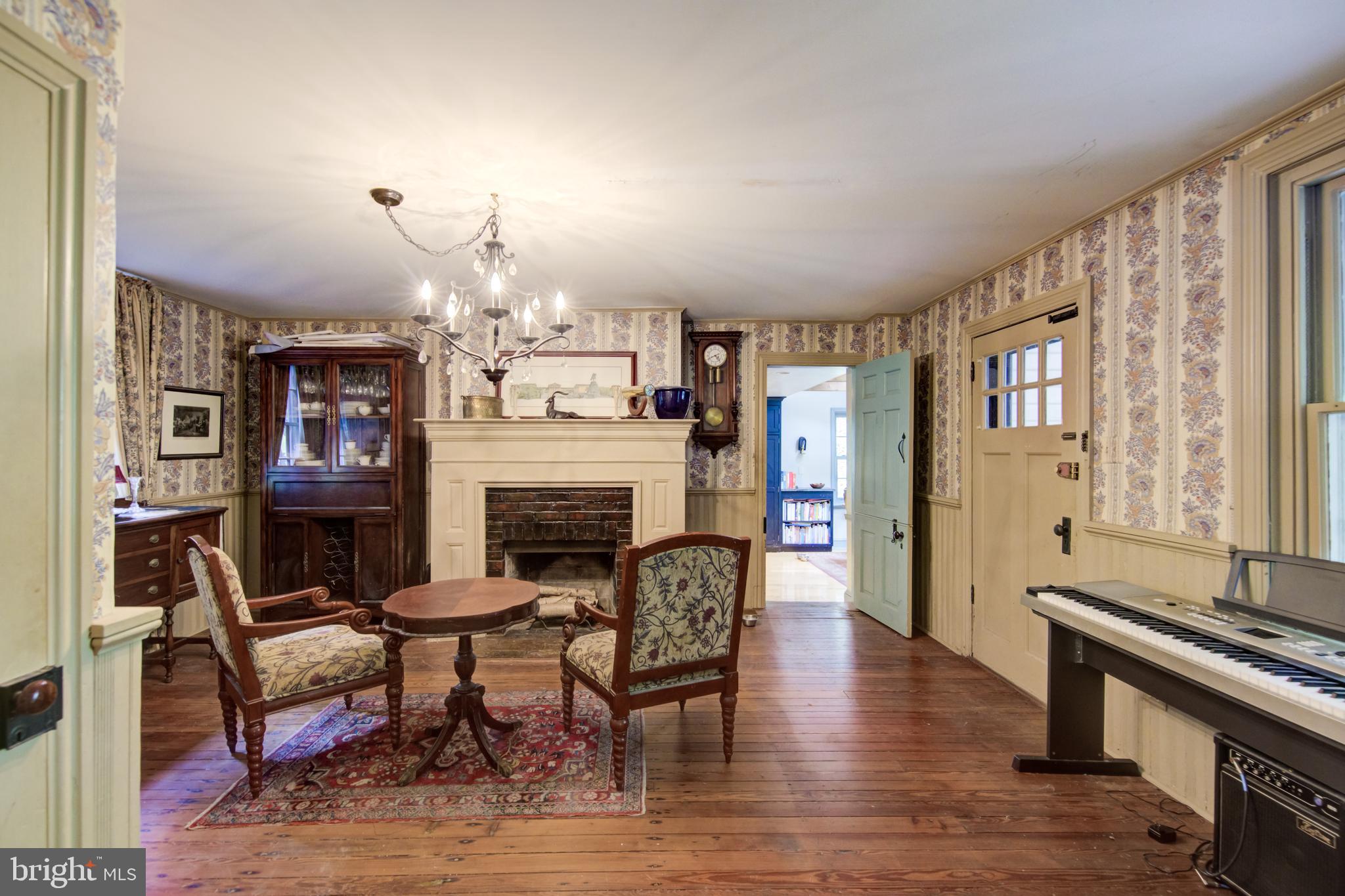 840 Upper Gulph Road Wayne, PA 19087 - Photo 5 of 25 Dining Room w/fireplace & access to patio