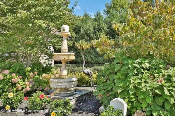 a view of a statue in a garden