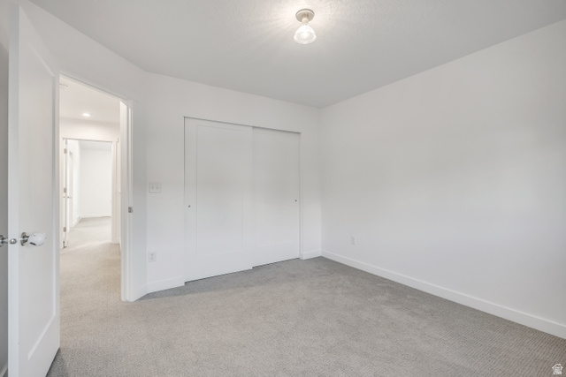 1058 Lilac Way Mapleton, UT 84664 - Photo 20 of 28 bedroom featuring carpet flooring and a closet