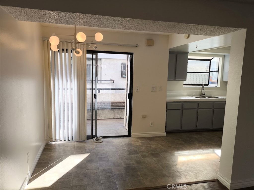 125 North 3rd Street, Unit D Alhambra, CA 91801 - Photo 3 of 16 a view of a utility room with a fireplace