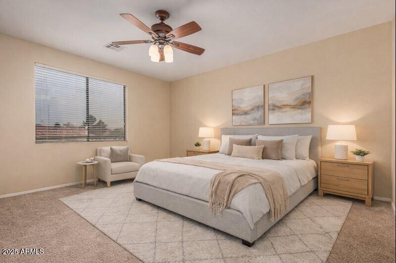 705 West Queen Creek Road, Unit 1201 Chandler, AZ 85248 - Photo 15 of 51 a bedroom with a large bed and windows