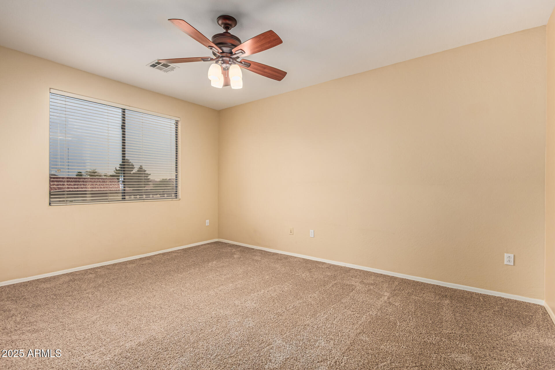 705 West Queen Creek Road, Unit 1201 Chandler, AZ 85248 - Photo 16 of 51 an empty room with a window