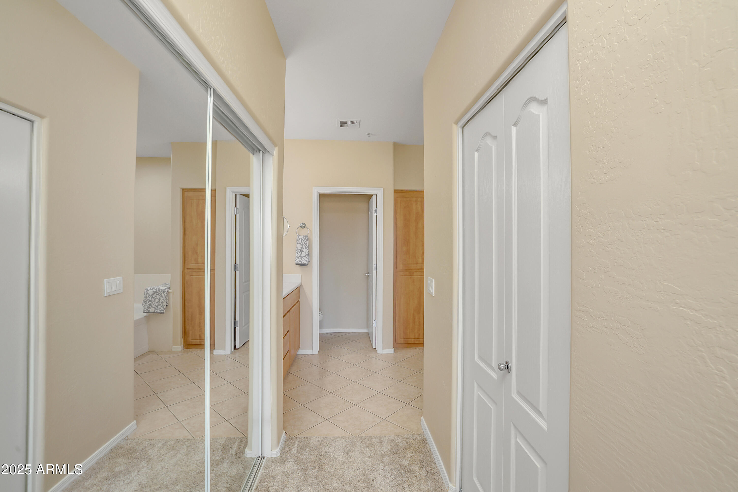 705 West Queen Creek Road, Unit 1201 Chandler, AZ 85248 - Photo 19 of 51 a view of a bathroom with a shower