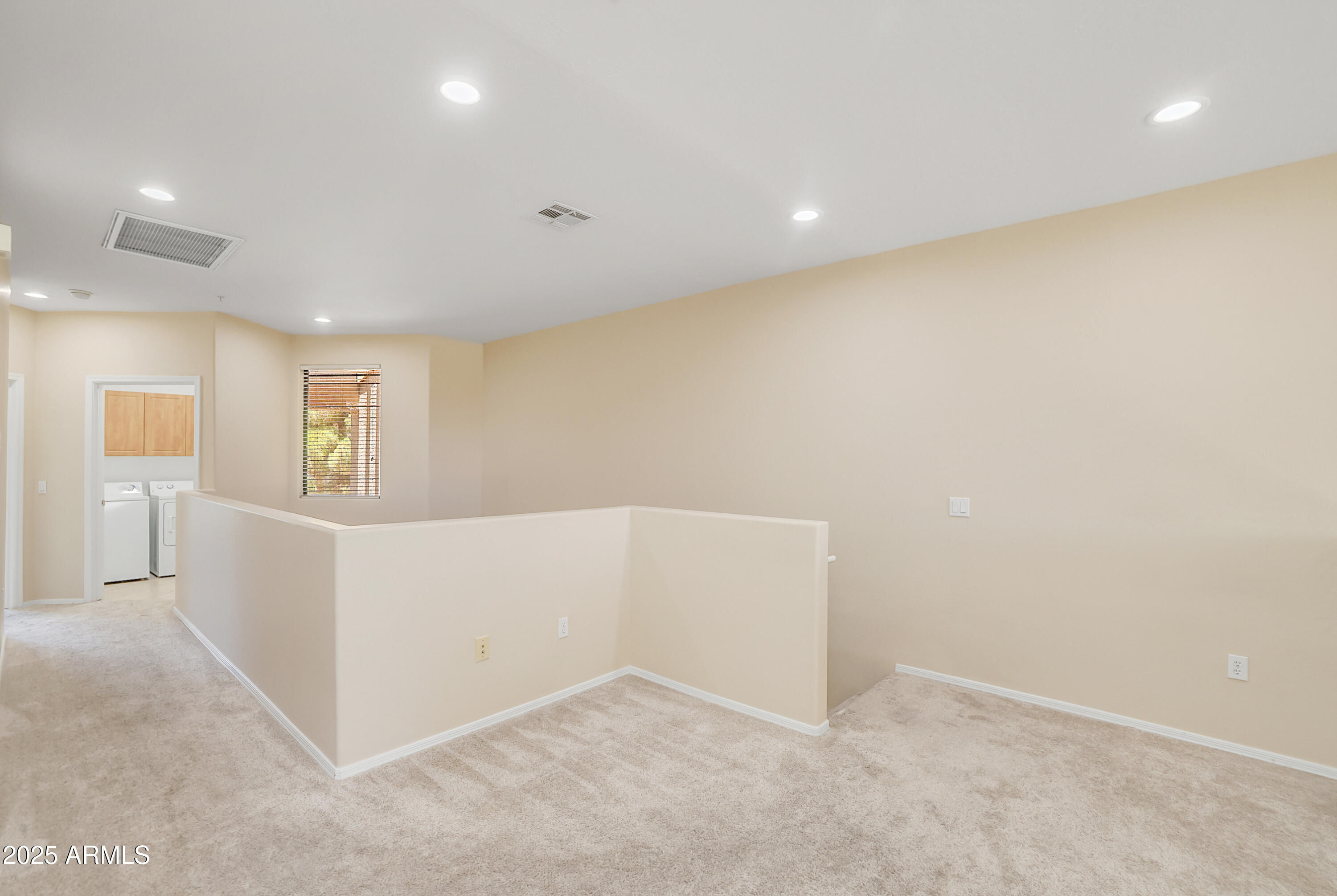 705 West Queen Creek Road, Unit 1201 Chandler, AZ 85248 - Photo 22 of 51 wooden floor in an empty room with a window