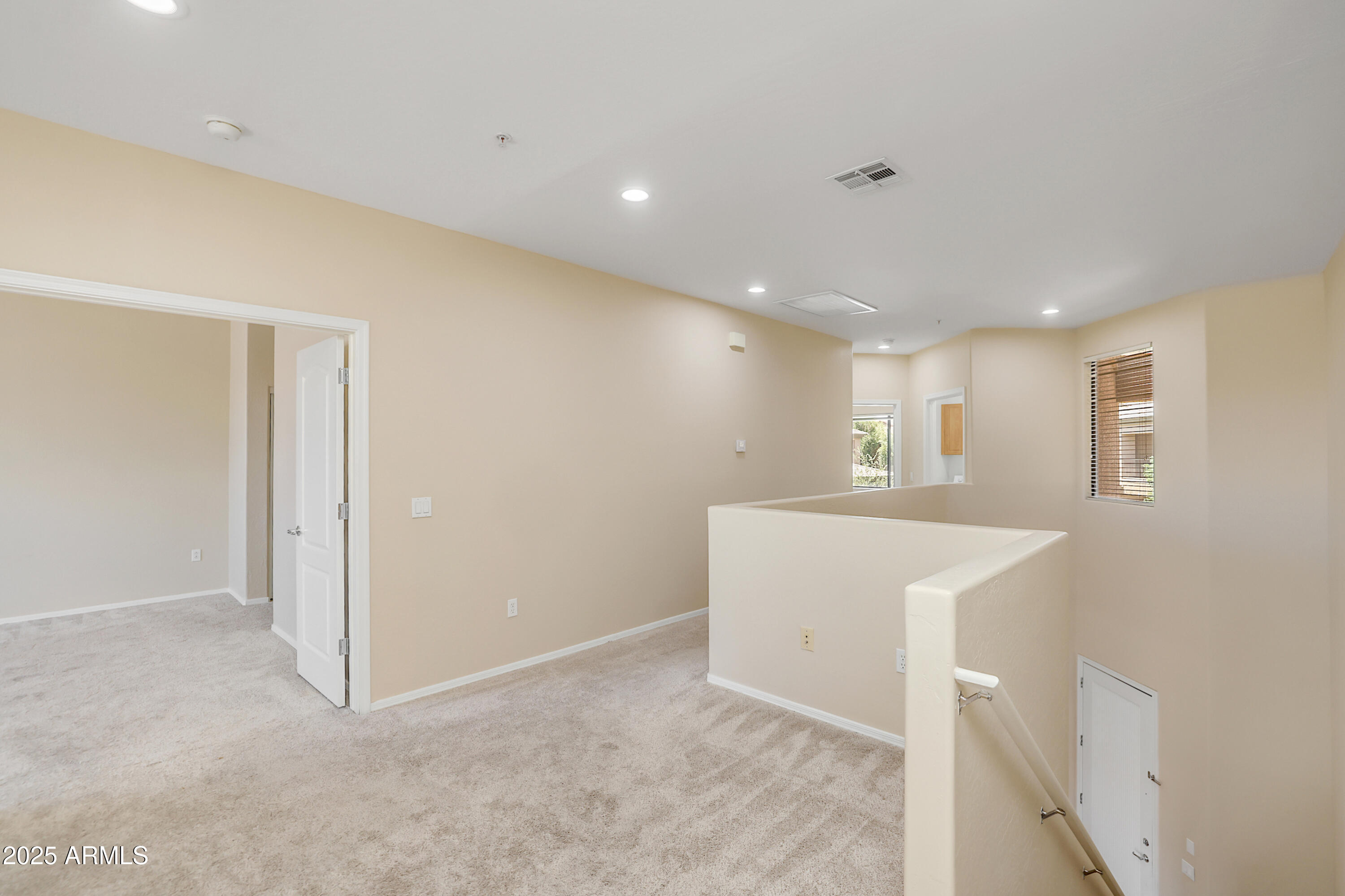 705 West Queen Creek Road, Unit 1201 Chandler, AZ 85248 - Photo 23 of 51 a view of a big room with windows and chandelier