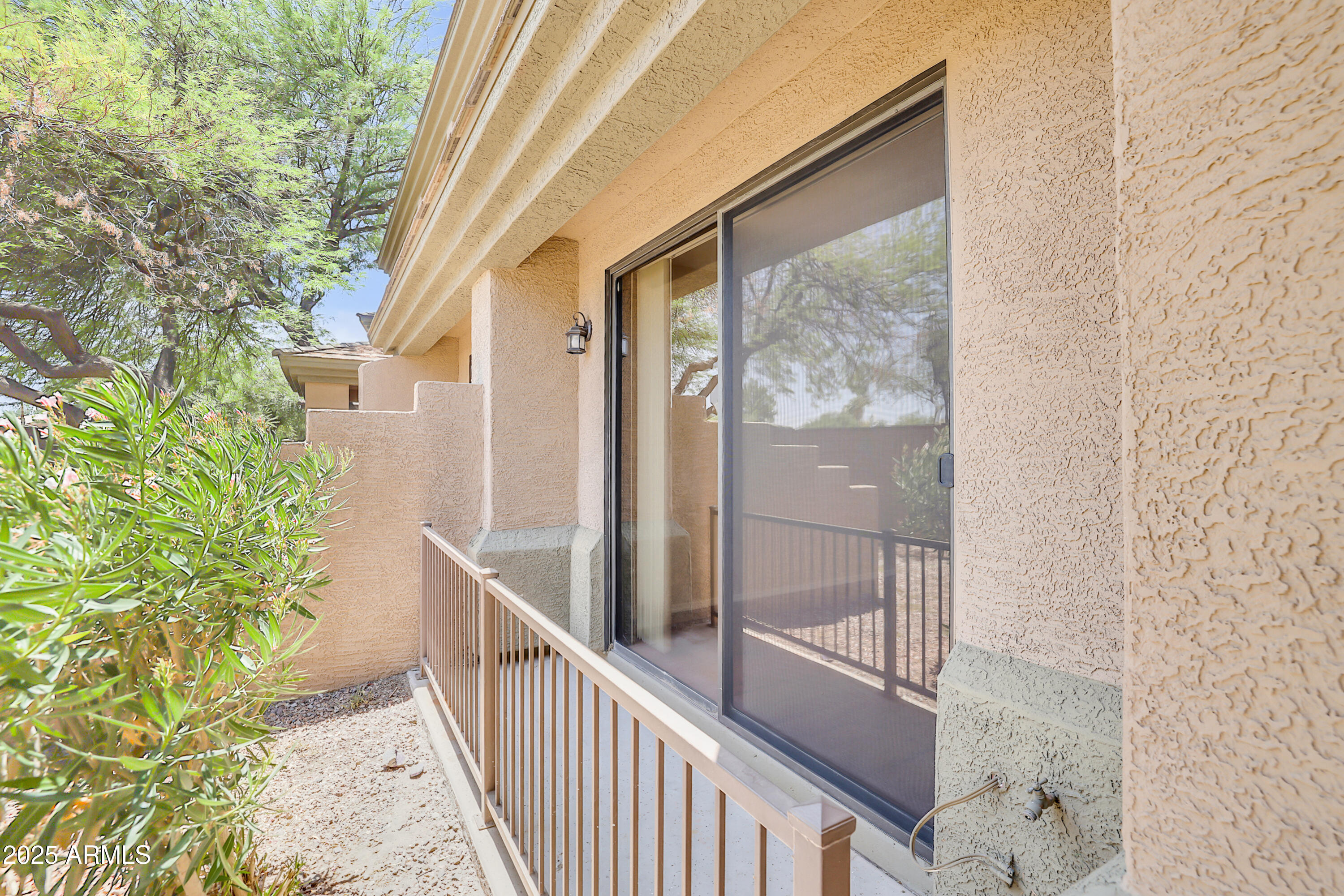 705 West Queen Creek Road, Unit 1201 Chandler, AZ 85248 - Photo 32 of 51 a view of a balcony with wooden floor