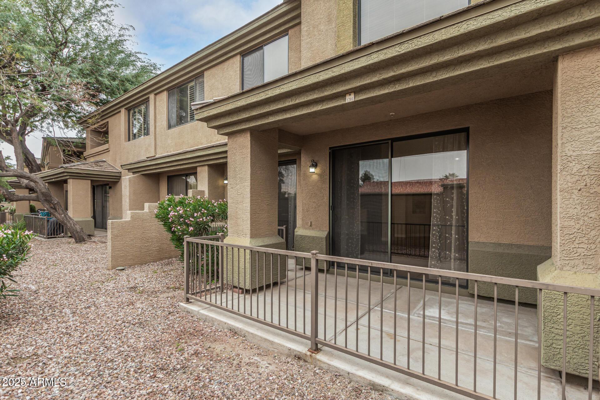 705 West Queen Creek Road, Unit 1201 Chandler, AZ 85248 - Photo 35 of 51 a view of a house with a small window