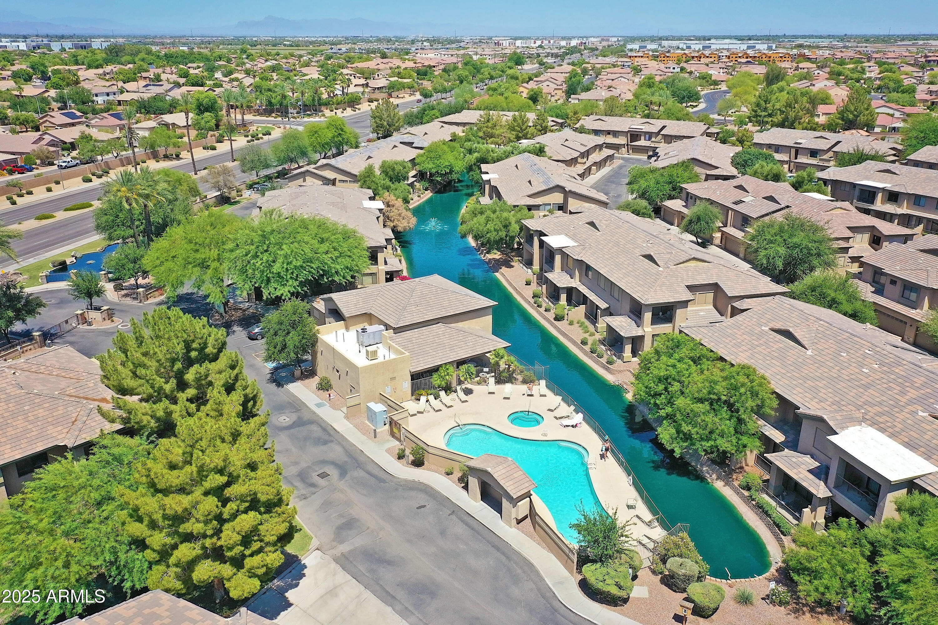705 West Queen Creek Road, Unit 1201 Chandler, AZ 85248 - Photo 40 of 51 an aerial view of residential houses with outdoor space