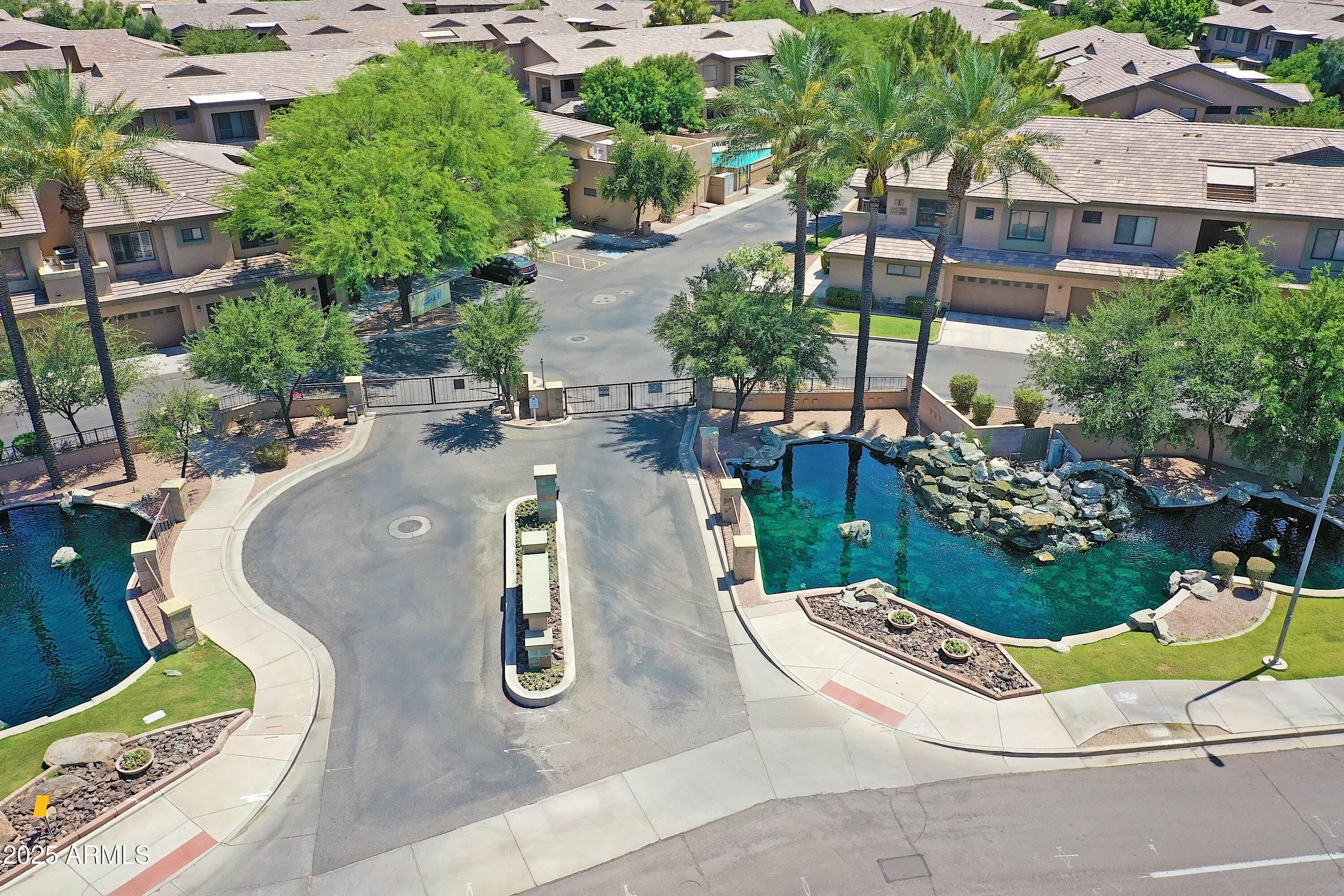 705 West Queen Creek Road, Unit 1201 Chandler, AZ 85248 - Photo 47 of 51 an aerial view of a swimming pool and outdoor space