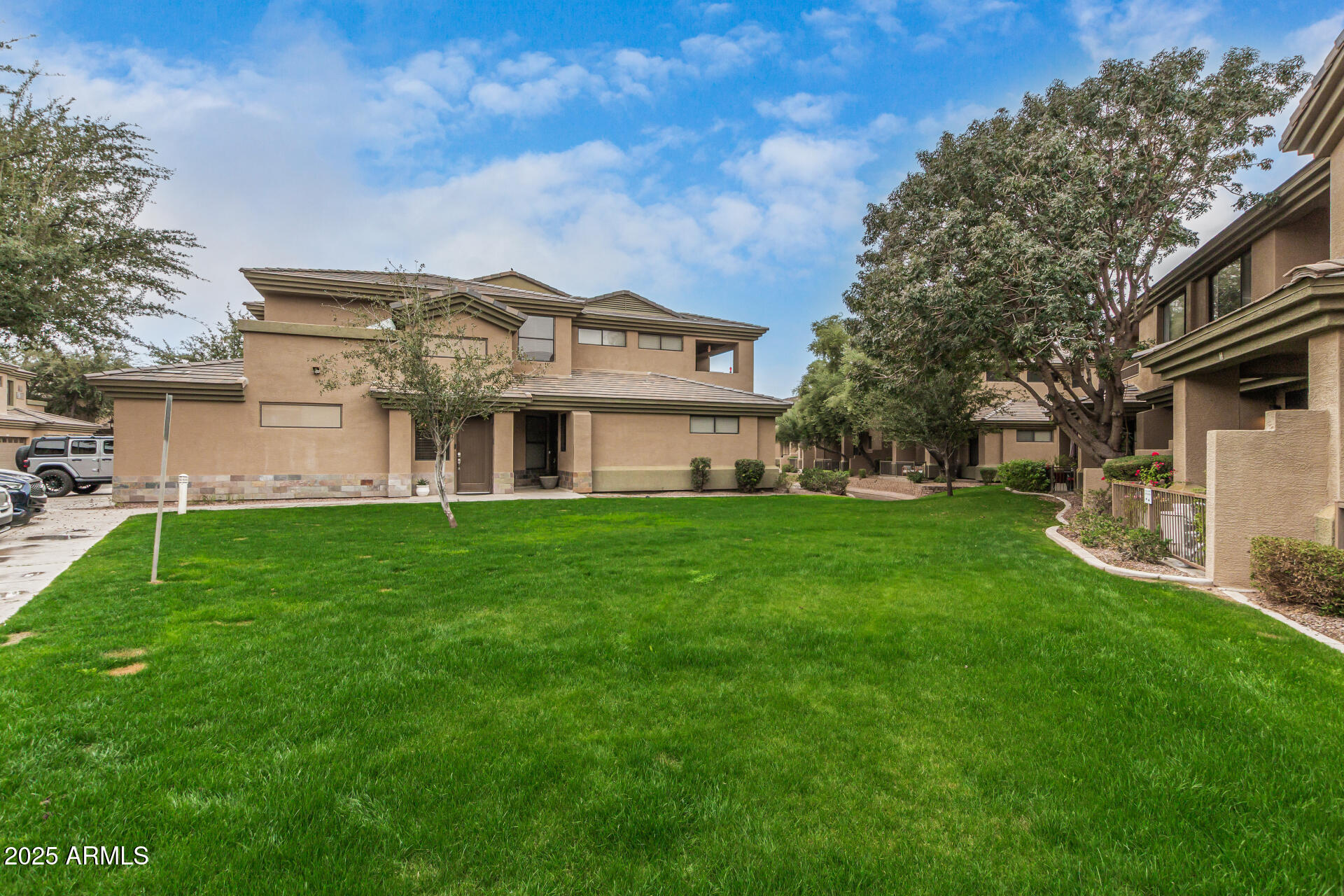 705 West Queen Creek Road, Unit 1201 Chandler, AZ 85248 - Photo 49 of 51 a front view of house with yard