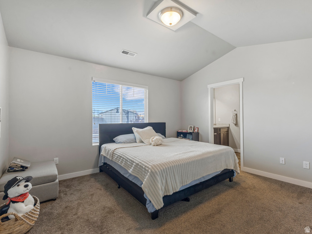 12214 Sunpark Lane Draper, UT 84020 - Photo 11 of 24 Carpeted bedroom featuring vaulted ceiling and ensuite bathroom
