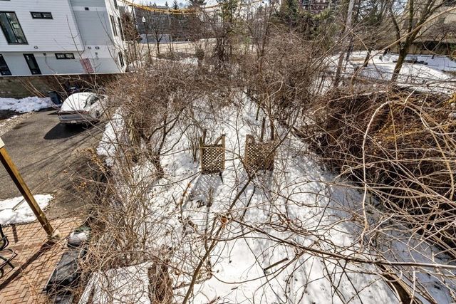 a view of balcony with a tree