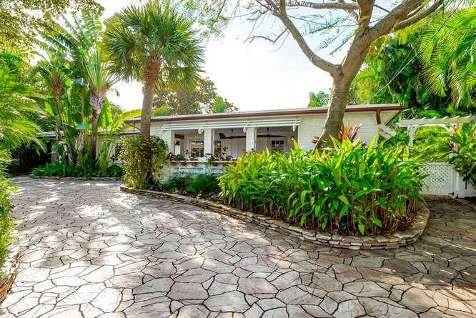 760 Northeast 71st Street Boca Raton, FL 33487 - Photo 1 of 15 Must See Property-small-001-21-Home Fron