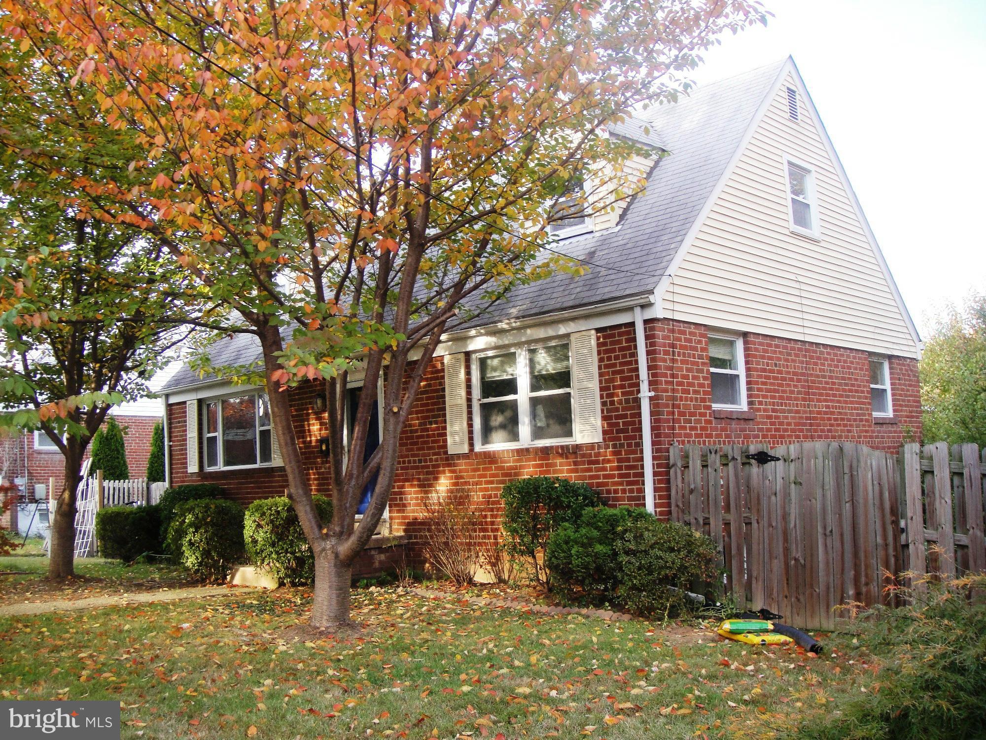 3701 Kayson Street Silver Spring, MD 20906 - Photo 1 of 30 a front view of a house with a yard