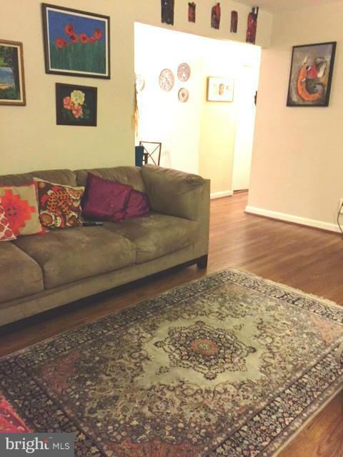 3701 Kayson Street Silver Spring, MD 20906 - Photo 3 of 30 a living room with a couch