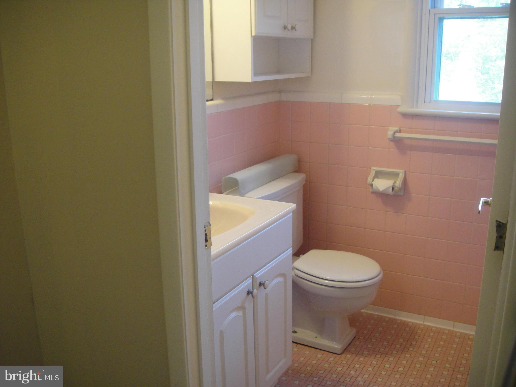 3701 Kayson Street Silver Spring, MD 20906 - Photo 22 of 30 a bathroom with a sink and a toilet