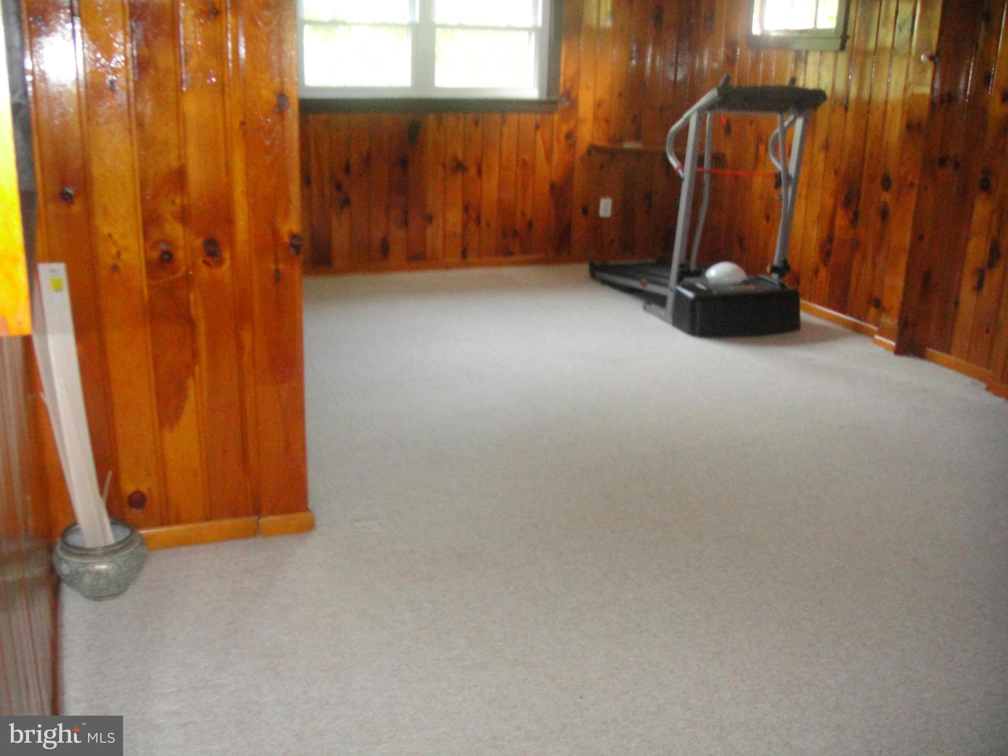 3701 Kayson Street Silver Spring, MD 20906 - Photo 23 of 30 a view of a room with gym equipment