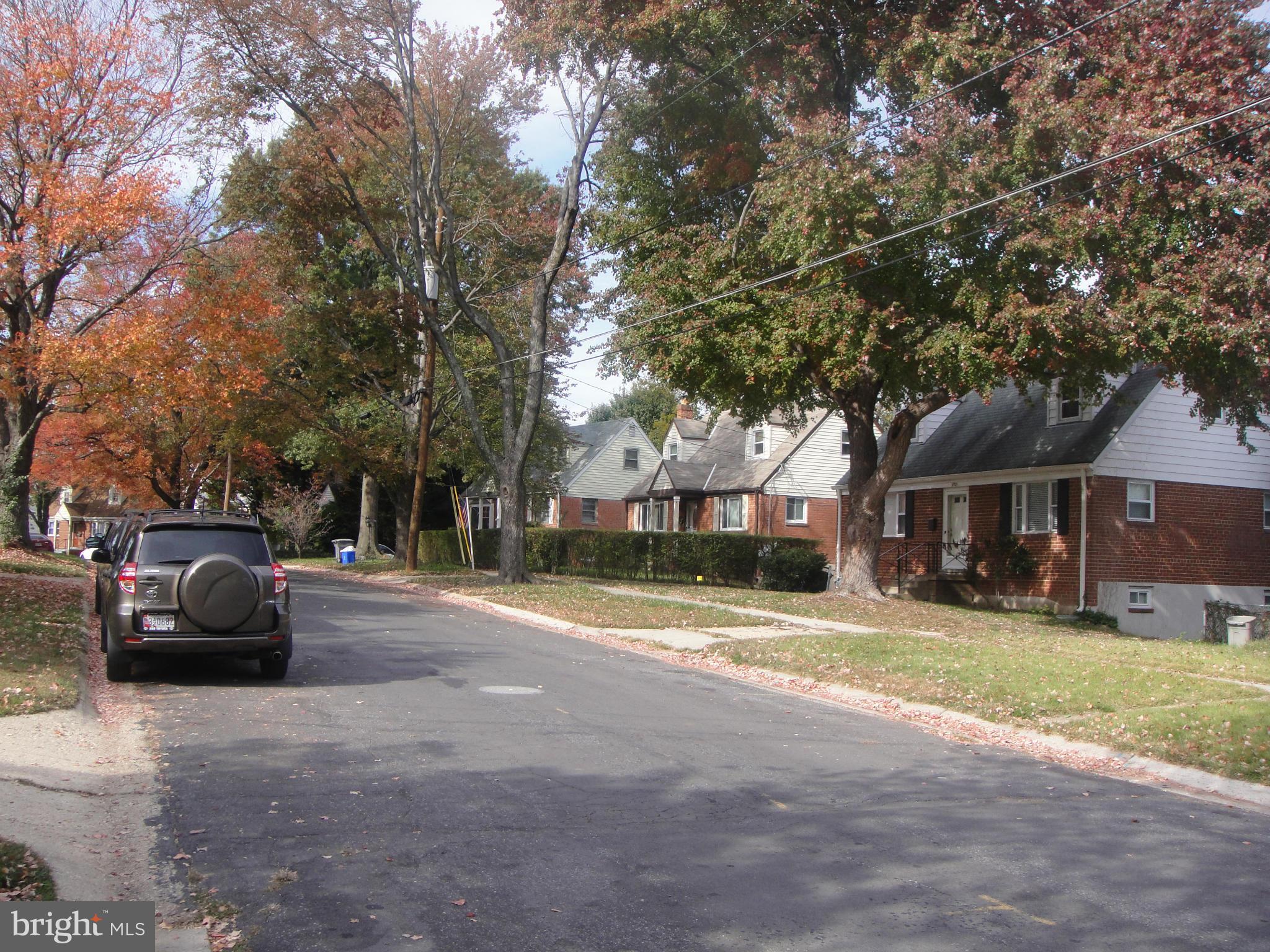 3701 Kayson Street Silver Spring, MD 20906 - Photo 29 of 30 a view of a street with houses on both side