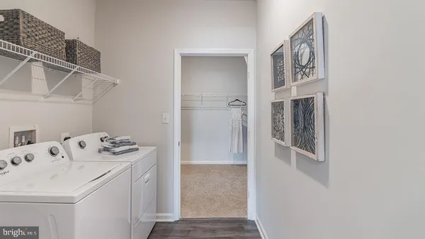 a storage room with washer and dryer