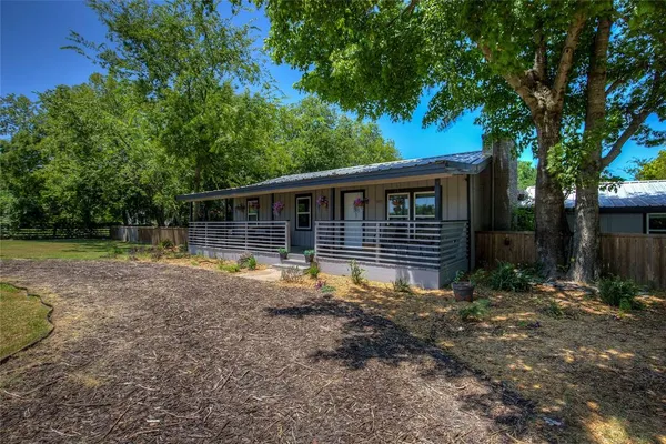 a view of backyard with green space