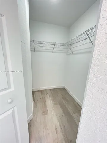 a view of a room with racks on the wall