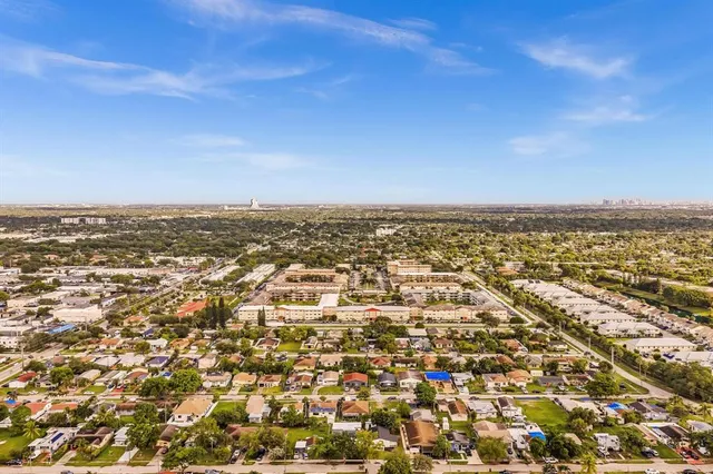 an aerial view of residential house with parking space