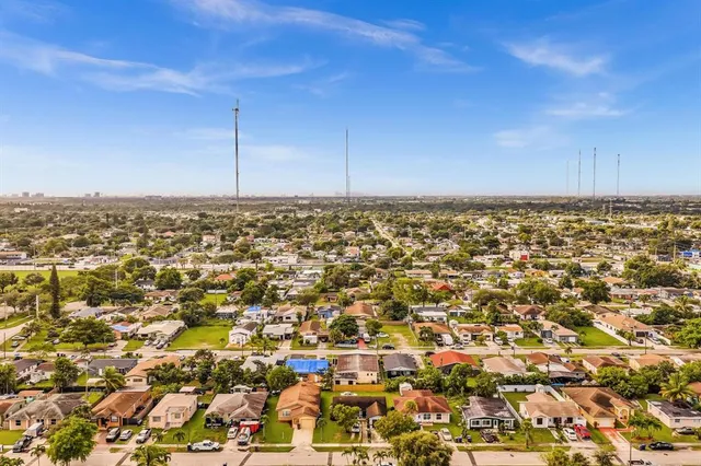 an aerial view of residential building with parking space