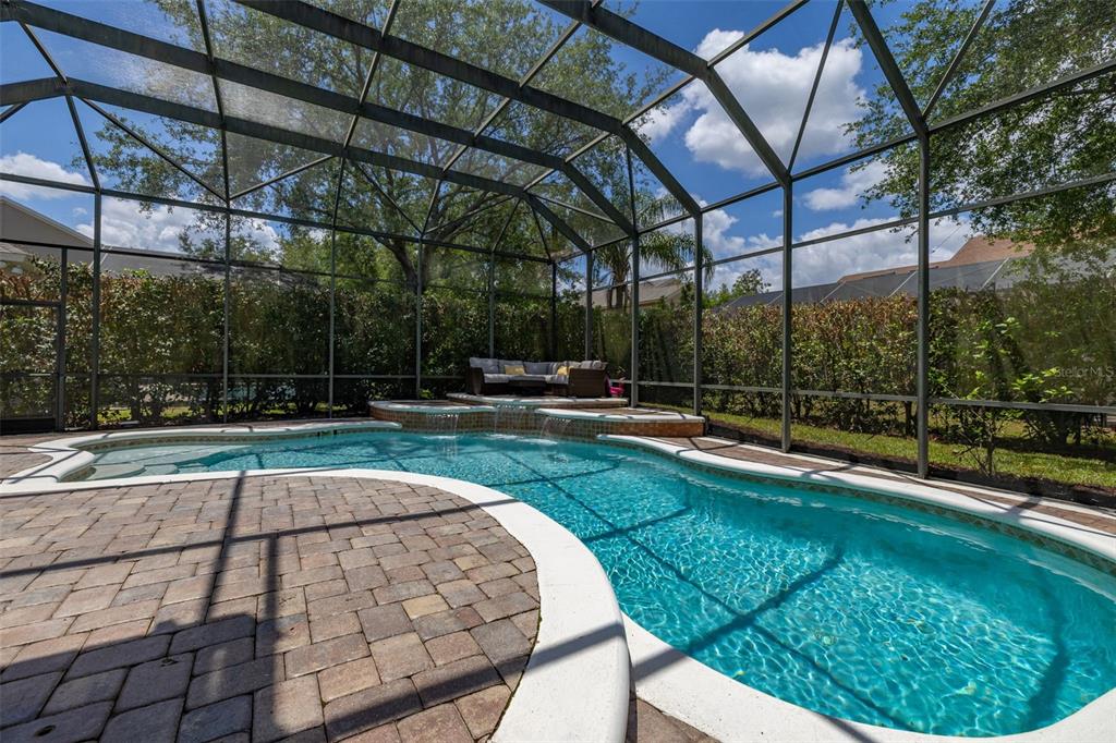 8351 Bowden Way Windermere, FL 34786 - Photo 48 of 71 a view of a swimming pool with a patio