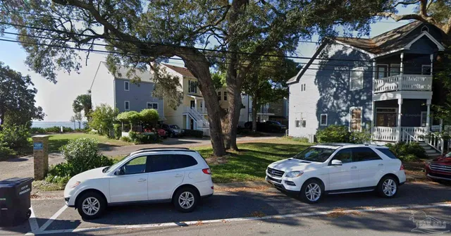 a car parked in front of a house
