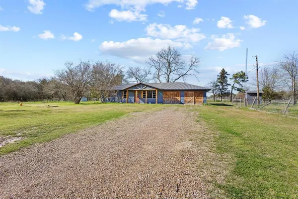 a front view of house with yard