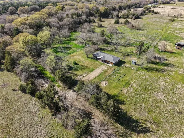 a aerial view of residential house with parking space